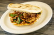 Start with the cumin lamb burger, a craveable twist on the traditional paomo, lamb stew with chunks of steamed flatbread.