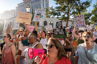 The Bans Off Our Bodies’ peaceful march on Las Vegas Boulevard gathered near the Bellagio Fountain on July 8.