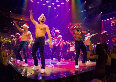 Designers have decked the halls of the Magic Mike Live Theater with new seasonal decor like festive balcony lights and bar wreaths, and new dance and aerial numbers have been introduced.