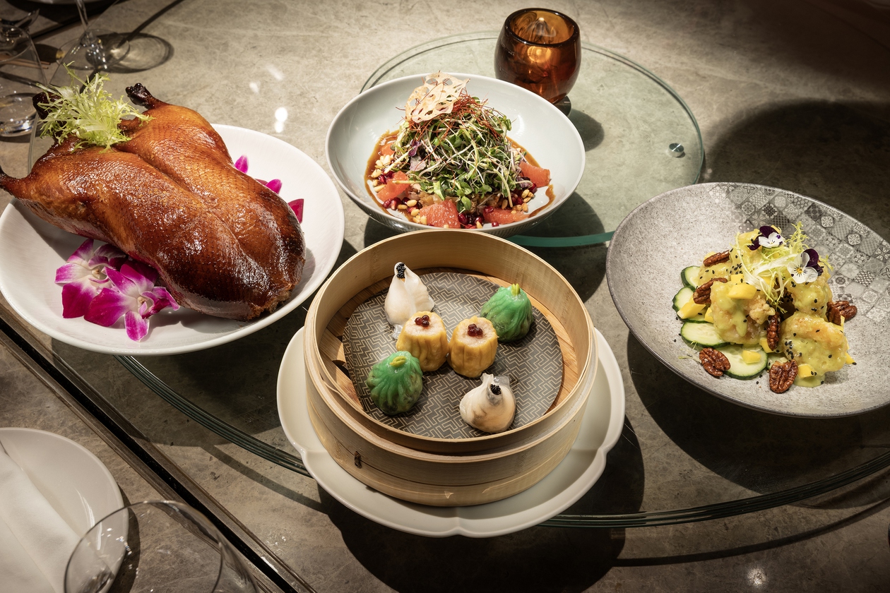 The kitchen doors seem to never stop swinging with waitstaff going in and out, fetching a vast array of savory bites and wok-fired delicacies.