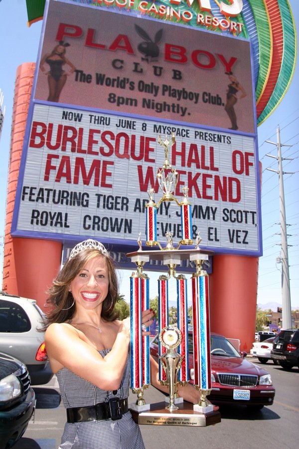Miss Angie Pontani celebrates her win and her trophy at the Palms.