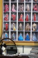 A grid of photographs displays the dresses Fuchs may use in her October 14 fashion show.