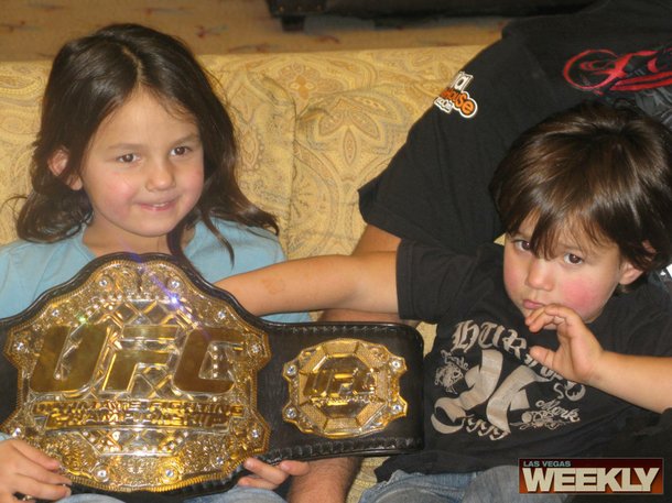 Frank Mir's children hold onto their dad's new interim Heavyweight belt.