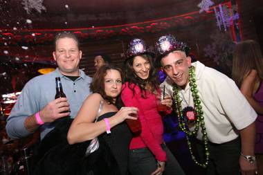 Whether they were dressed in their finest outfits or sporting goofy hats and sunglasses, thousands of people across Summerlin rang in the New Year with style on Dec. 31.