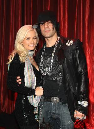 Holly Madison and Criss Angel.