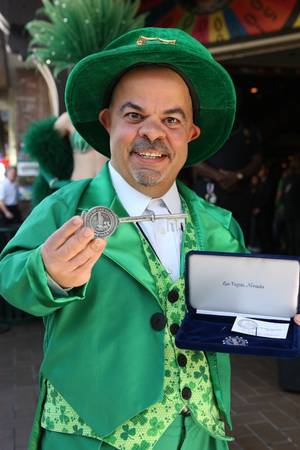 O'Sheas' lucky leprechaun (Brian Thomas) and the key to the city.
