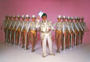 Liberace with the Rockettes.