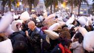 Last Saturday over a thousand New Yorkers gathered on Wall Street to let feathers fly for World Pillow Fight Day.