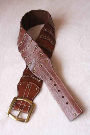 Michael Kors leather belt = salon services.