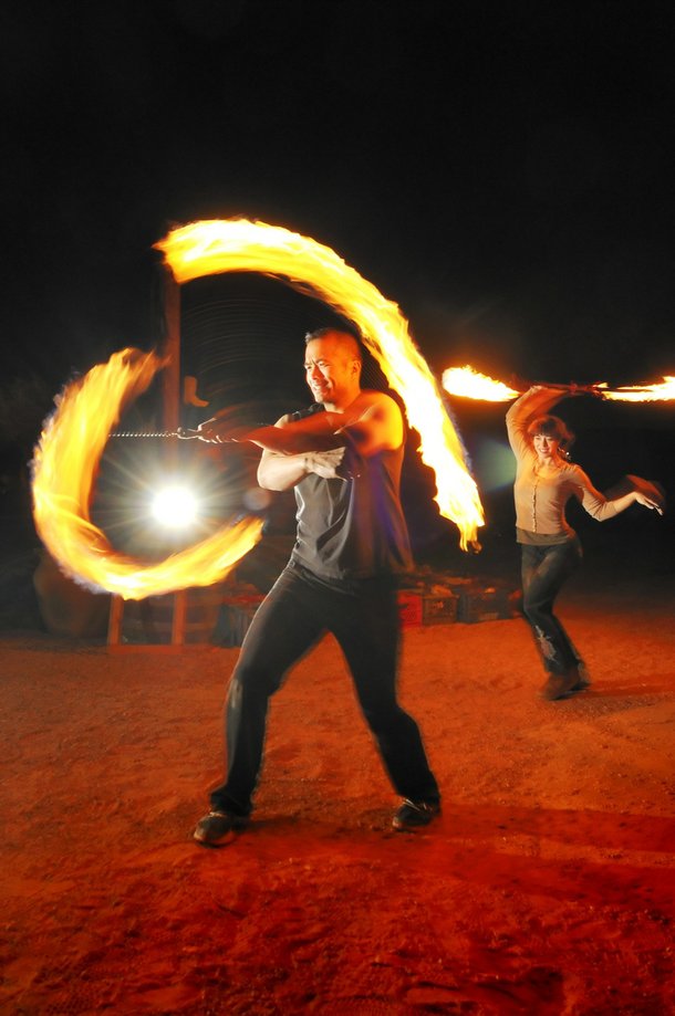 Tam's methods of conquering fear includes fire spinning.