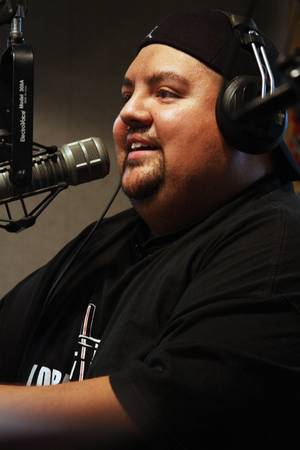 Comedian Gabriel Iglesias chats on air during Xtreme Radio 107.5-FM's DAM Morning Show as part of a six-stop media tour to promote his July 25 show at the Pearl.