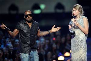 Kanye West interrupts Taylor Swift after her VMA for Best Female Music Video.