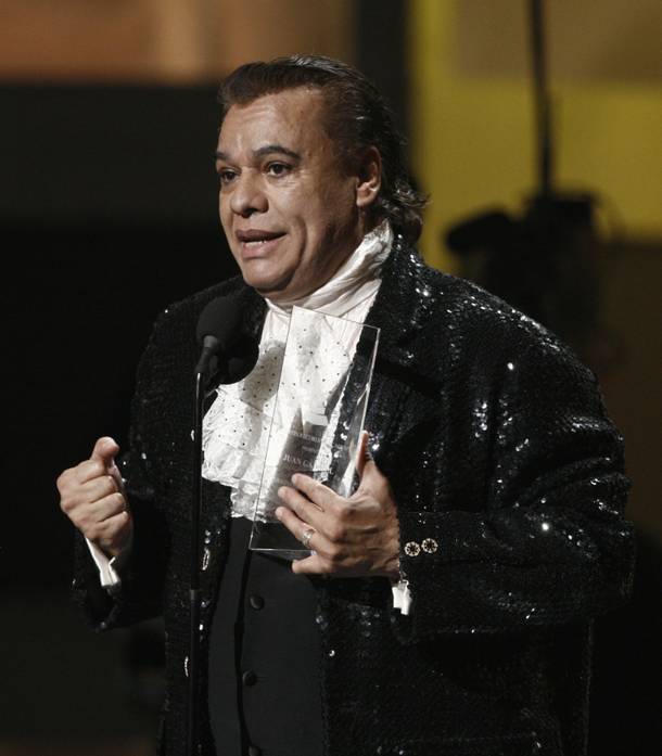 Juan Gabriel accepts his award for Latin Recording Academy Person of the Year during the awards show at the Mandalay Bay Events Center.