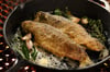 Crispy-skin branzino griddled in a cast iron pan at Michael Mina's fifth Las Vegas restaurant, American Fish.