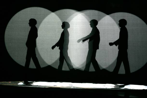 Silhouettes of the Beatles are shown during Cirque Du Soleil's Love at the Mirage Friday, Dec. 19, 2008. 