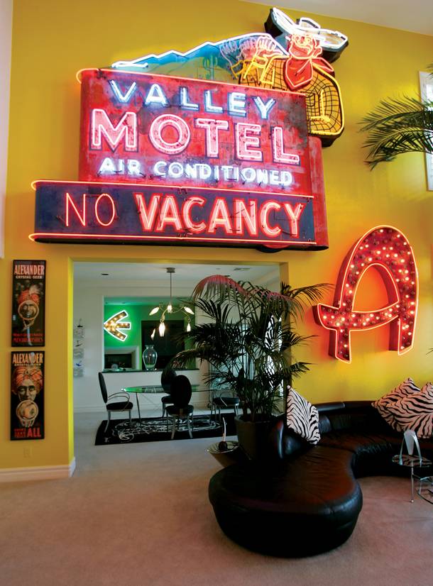 Wyrick's lavishly furnished home complete with neon signs and original art.