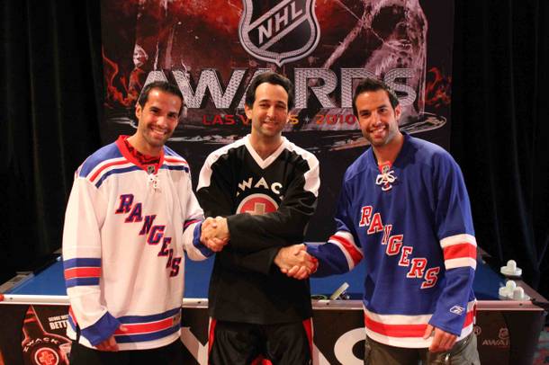 Michael Rosen shakes hands with Chris and Peter Ferrara (NHL former Rangers players)