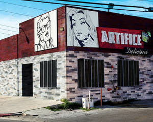 Juan Muniz murals are featured on the outside of Artifice. 