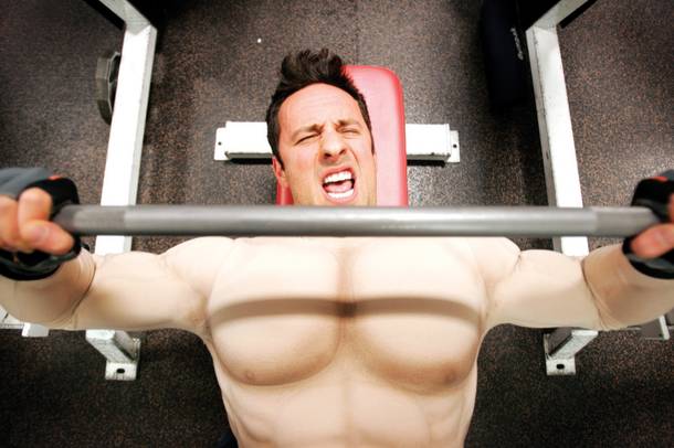 Las Vegas Weekly reporter Rick Lax works out in a muscle suit at Las Vegas Athletic Club.