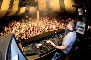 Resident DJ Kaskade packs Marquee nightclub with EDM fans.