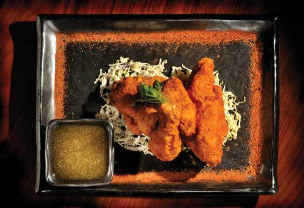 The fried chicken that launched 1,000 accolades, served with wasabi-honey dipping sauce.