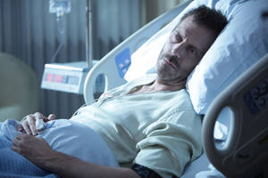 That's Hugh Laurie hospitalized because he misses Lisa Edelstein so damn much. 