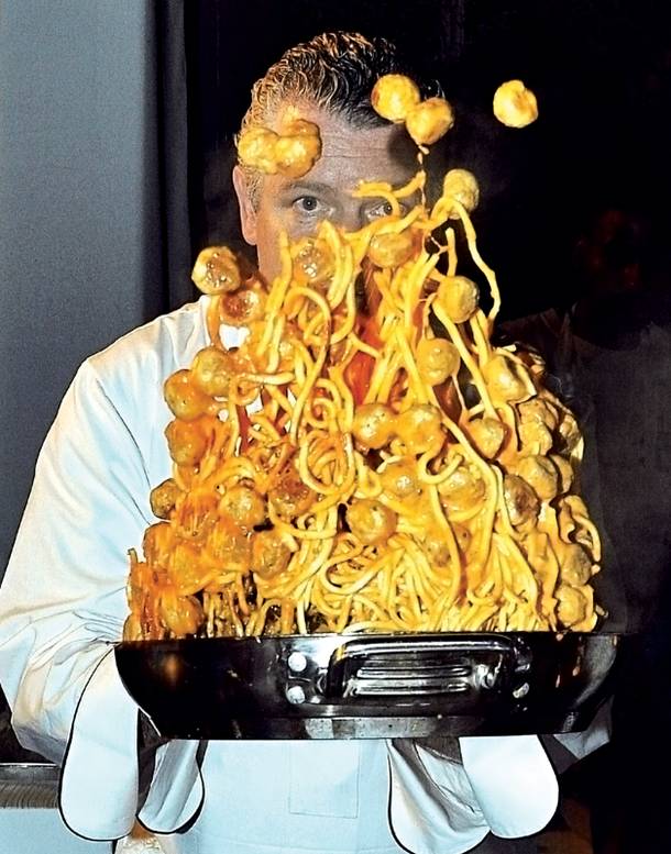 Valentino's Luciano Pellegrini gives his pasta a flip.