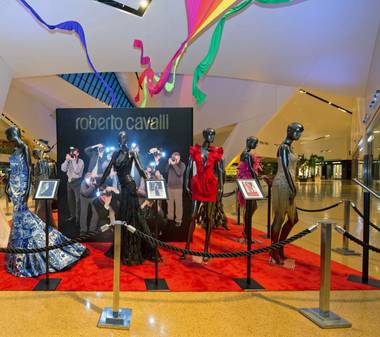 Roberto Cavalli gowns, worn by A-listers on the red carpet, are on display at Crystals through August 3. 
