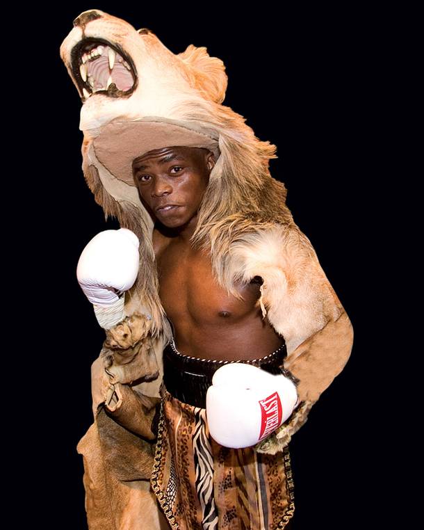 Bogere in the lion headdress he wears to the ring.