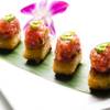 Koi's crispy rice is addictive all by itself, but it comes topped with Kobe beef, yellowtail tartare, or here, spicy tuna.