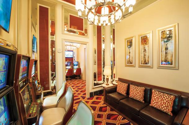 The parlor also includes amenities for players' friends, including sofas and televisions.