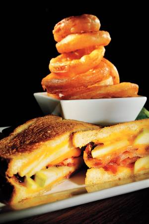 Try the green apple, bacon and cheddar grilled cheese at Aces & Ales.