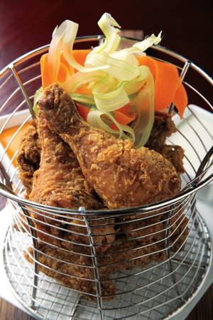 The Rx Boiler Room version of wings is lovely, crispy fried game hen served with vegetable ribbons and dipping sauces of blue cheese and hot sauce.