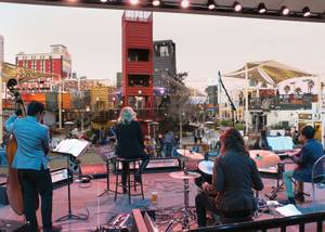 Kids at the mall: Megan Marie Ward and members of LVA student band Swayd at Container Park.