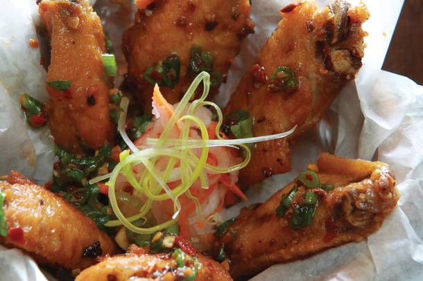 Tamarind-glazed chicken wings are a solid starter for any meal at District One.