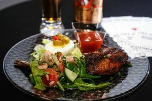 Brooklyn Bowl will offer a trio of favorites at LIB: egg shooters, smoked trout salad and smoked chicken wings.