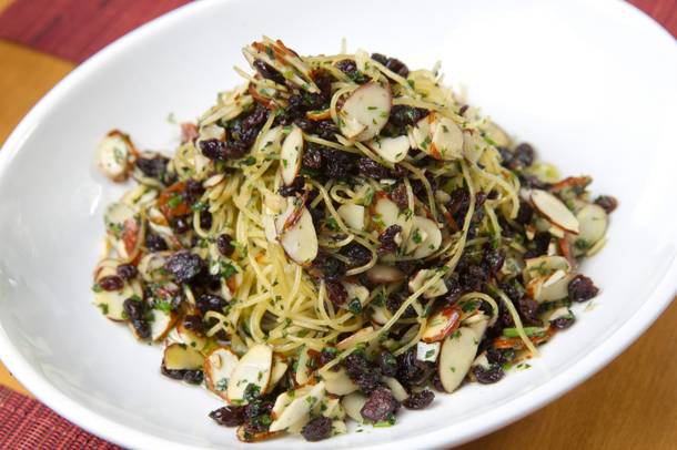 Pasta perfection: Angel hair with garlic, anchovy, fresh parsley, almonds and currants.