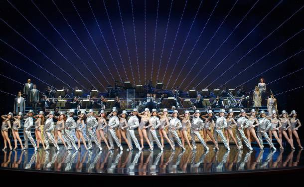 Cast members of 'ShowStoppers' perform 'One' from 'A Chorus Line.' 