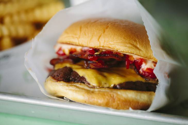 Shake Shack's SmokeShack burger adds smoky bacon and spicy cherry peppers to the mix.