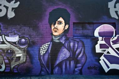 Purple reign: Downtown’s freshly painted Prince mural, by local artist Krie of JHF Crew.