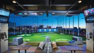 Topgolf is not your average driving range. Where else can you watch football on a 28-by-50-foot screen?