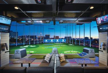 Topgolf is not your average driving range. Where else can you watch football on a 28-by-50-foot screen?