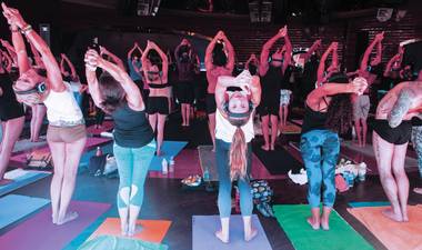 Communal Silent Savasana yoga has become Las Vegas’ unlikeliest craze