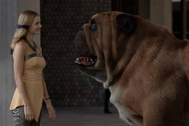 Inhumans’ Crystal and Lockjaw share a moment.