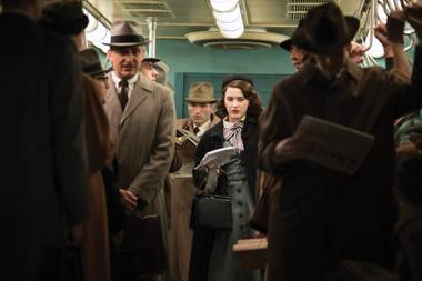Mrs. Maisel takes the subway.