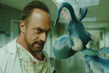 Christopher Meloni and Happy the flying blue unicorn.
