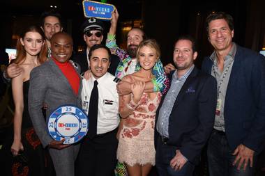 Zimmet (second from right) with the cast and crew of LA to Vegas at a premiere party.
