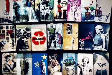 Local artist and educator Shilo Lewis—aka “Cooptylew”—has designed a Banksy tarot card deck.