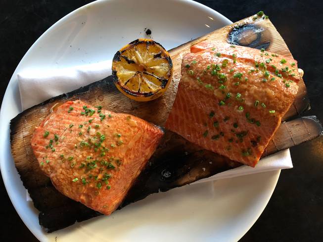 Cedar-smoked salmon is a must-order at Momofuku.