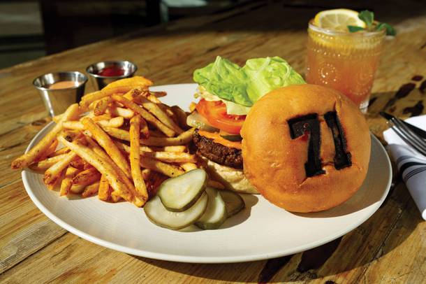 Karlsson’s Vegan Burger with fries and a Sweet Tea cocktail